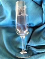 Product Description: Enjoy your bubbly in this Casa Romantica 8 ounce Champagne Flute with our Logo engraved on the side. Cheers!</br> Casa Romantica Engraved Logo Champagne Flute