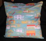 Product Description: Custom San Clemente Fabric adorns these beautiful pillows. Handmade by Casa volunteers these 16" squsre pillows show off iconic San Clemente images, including Casa Romantica, the Ole Hanson Beach Club, the Historic Pier, Pedros Tacos, and San Clemente High School Triton Gymnasium. This is the perfect pillow for anyone who lievs in or loves San Clemente.</br> San Clemente Iconic Images Pillow
