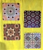 Product Description: Our cardboard coasters are printed with the design from some of the most popular encaustic tiles found in the Courtyard at Casa Romantica. Buy one design or all 4 designs - these are a perfect reminder of your time at Casa Romantica. From top left clockwise: Design 1 - Green center floral, Design 2 - Hexagon floral, Design 3 - Geometric light background, Design 4 - Geometric dark background</br> Casa Romantica Cardboard Coasters