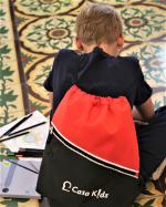 Product Description: Our Casa Kids Logo drawstring backpacks feature and red and black design and are very sturdy. Send your child to school or on an overnight to grandma's with this stylish backpack.</br> Casa Kids Logo Backpack